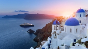 3D Blue domed churches at sunset, Oia, Santorini